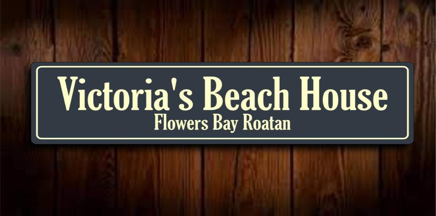 Victoria S Beach House And Snorkeling Center Flowers Bay ภายนอก รูปภาพ